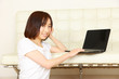 young women relaxing and using laptop computer
