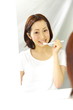 Woman brushes her teeth/歯を磨く女性