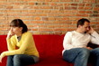Video: Relationship difficulties, young couple sitting on sofa apart Relationship difficulties, young couple sitting on sofa apart
