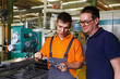 instructor and trainee with caliper rule 01