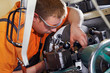 trainee at a metal working lathe 04