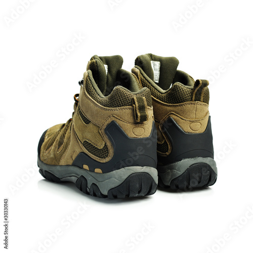 Photo: Walking boots on white background Walking boots on white background