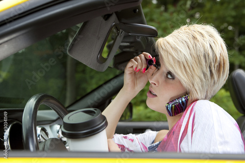Photo: Barbie distracted while driving Barbie distracted while driving