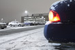 Exhaust fumes from an idling car warming up