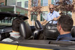 Work colleagues car pooling from the office