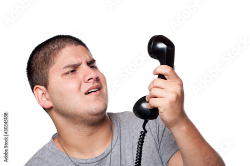 Photo: Man Screaming Into the Telephone Man Screaming Into the Telephone