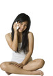 Asian woman with mobile telephone Asian woman with mobile telephone