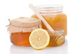 pot full of honey and lemon isolated on white pot full of honey and lemon isolated on white