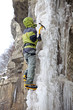 Man with ice axes and crampons