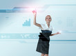 Attractive blonde touching the world map in virtual future