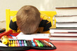 Boy sleeping over homework. Boy sleeping over homework.