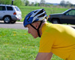 Senior Caucasian Man Biking with Bike Helmet Shirt