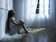 Beautiful woman at the window