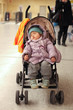 kid sleeping in pram