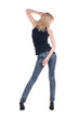 Young woman dancing. Rear view. Young woman dancing. Rear view.