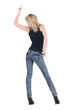 Young woman dancing. Rear view. Young woman dancing. Rear view.