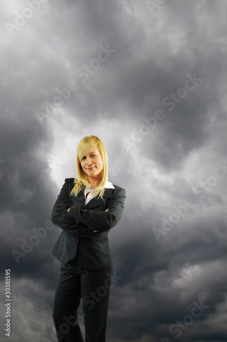 Photo: Businesswoman and black cloud Businesswoman and black cloud