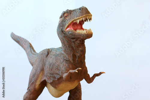 A Tyrannosaurus Rex Dinosaur With Gaping Jaws Full Of Teeth