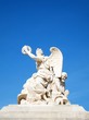Statue in facade of Versailles Chateau entrance