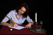 portrait of beautiful brown-haired girl writing work