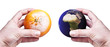 Hands holding a rotten orange and the world