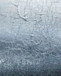 Wrinkled silver foil pattern reflective texture background Wrinkled silver foil pattern reflective texture background