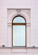 Old window on the pink wall