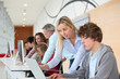 Group of students attending training course at school Group of students attending training course at school