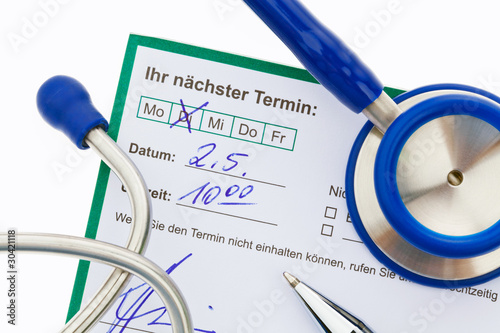 Foto: Stethoskop und Kalender. Arzttermin Stethoskop und Kalender. Arzttermin
