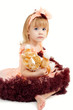 Photo: Portrait of the beautiful girl in a pink dress Portrait of the beautiful girl in a pink dress