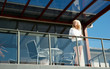 young woman on balcony
