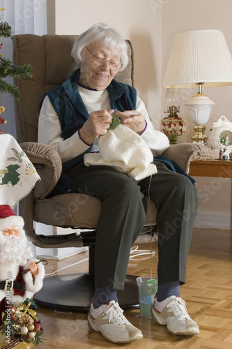 Photo: Senior woman knitting Senior woman knitting