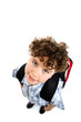 Young boy with backpack isolated on white background