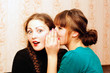Woman telling secrets