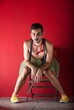 Performer seated backstage