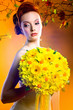 Photo: Gorgeous young redhead woman with bouquet of flowers Gorgeous young redhead woman with bouquet of flowers