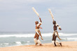 african dancers on beach