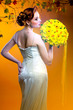 Photo: Gorgeous young redhead woman with bouquet of flowers Gorgeous young redhead woman with bouquet of flowers