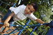 Young boy playing at a park Young boy playing at a park