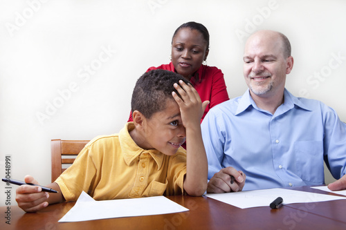 Photo: Parents helping with homework Parents helping with homework