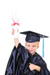 Young boy in graduation gown Young boy in graduation gown