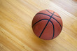 Photo: Basketball on hardwood Basketball on hardwood