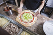 Photo: Chef making a pizza Chef making a pizza