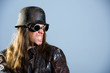 wild man with steel helmet and sunglasses