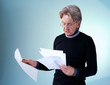 Senior man reading important papers