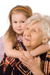 Photo: The elderly woman with the grand daughter The elderly woman with the grand daughter