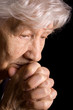 Portrait of the old woman a black background Portrait of the old woman a black background