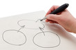 The hand with a pen drawing chart