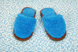 Pair of soft blue slippers Pair of soft blue slippers