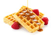 karamellsoße fließt über Waffeln